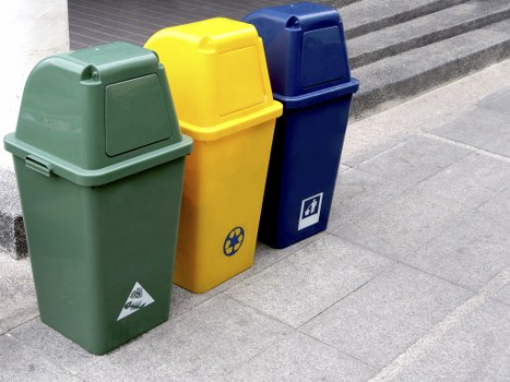 Workers segregating construction waste on site