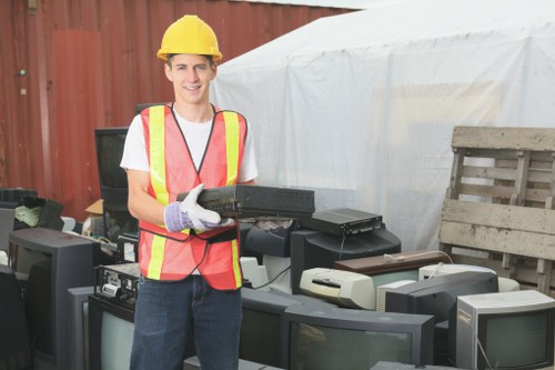 Customer service assisting with skip hire